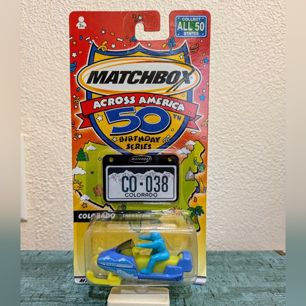 2/$18 VTG Matchbox Across America 50th Birthday Series Colorado Snowmobile 2001